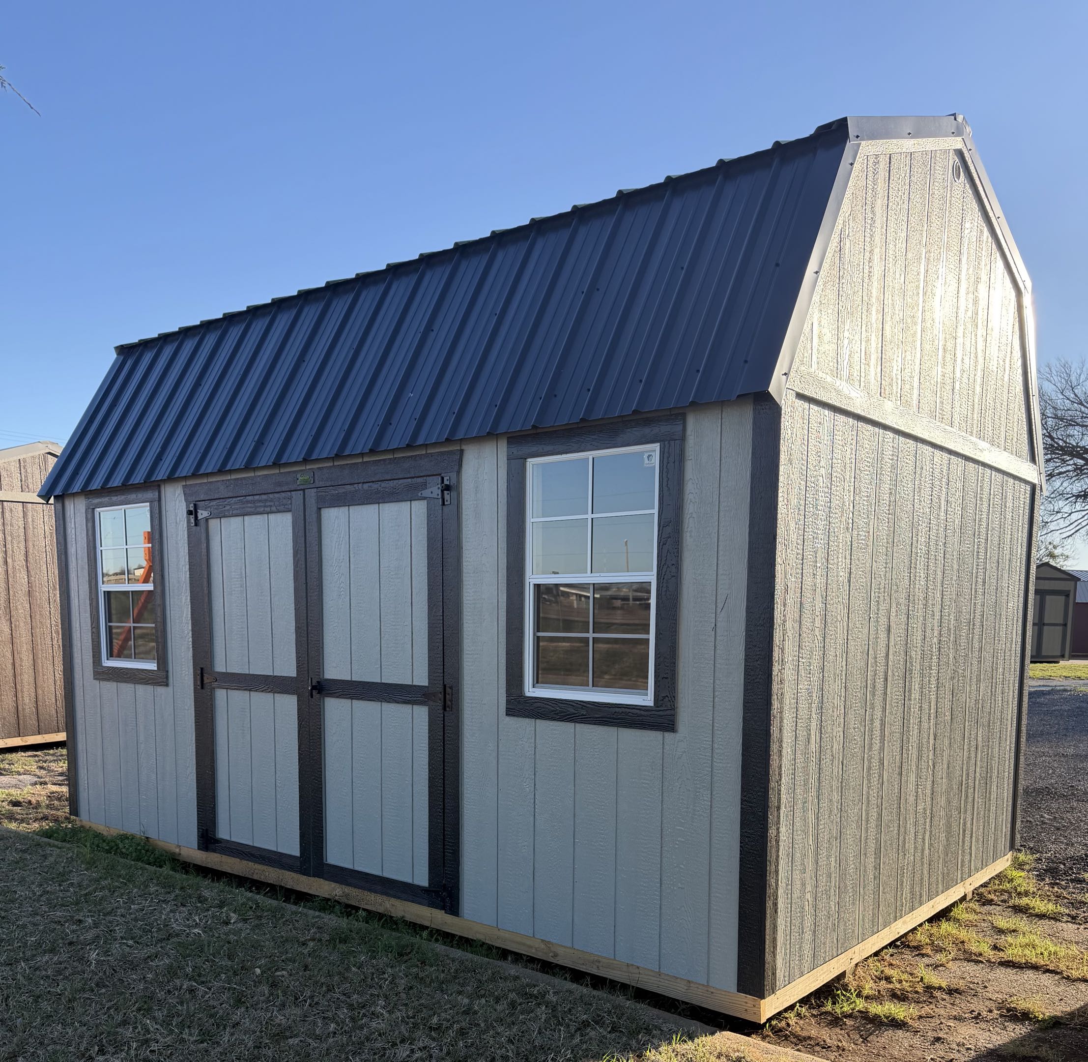 10x16 lofted barn, gray LP SmartSide with charcoal trim and metal roof